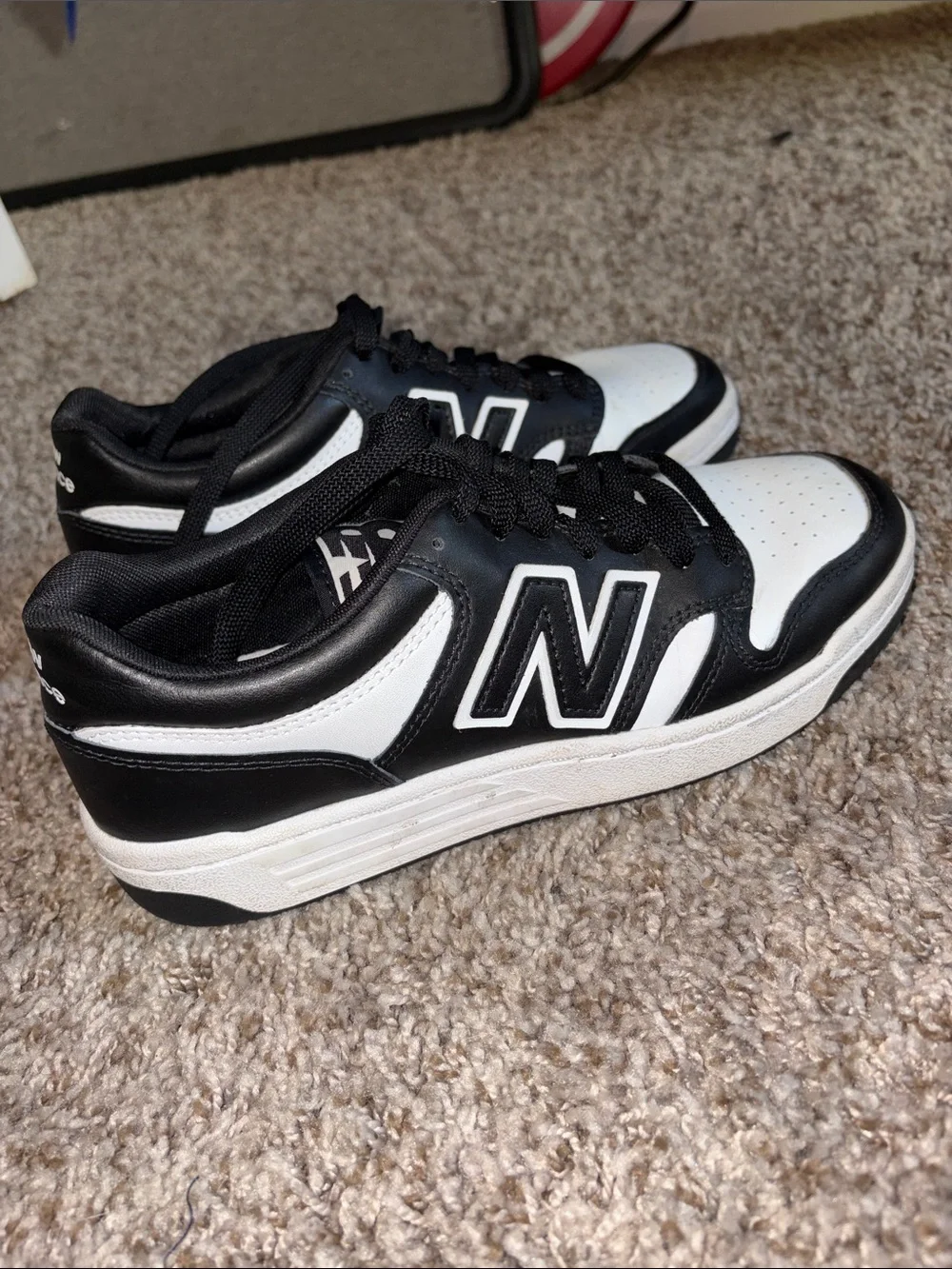 New Balance Men's Black and White Classic Low-Top Sneakers